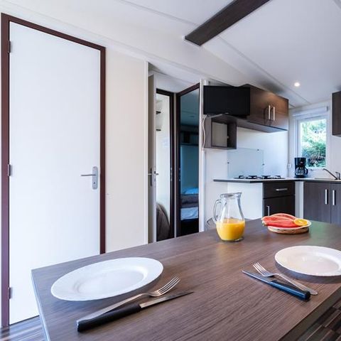 MOBILE HOME 2 people - Mobile-home Beach 18.6m² (over 10 years old) (1 bedroom) + Semi-covered wooden terrace + TV for 2 people