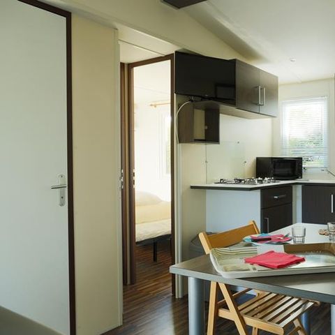 MOBILE HOME 2 people - Mobile-home Beach 18.6m² (over 10 years old) (1 bedroom) + Semi-covered wooden terrace + TV for 2 people