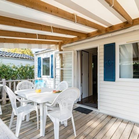 MOBILE HOME 2 people - Mobile-home Beach 18.6m² (over 10 years old) (1 bedroom) + Semi-covered wooden terrace + TV for 2 people