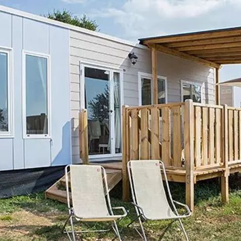 Mobile home 6 persons - Comfort | 2 Bedrooms | Sleeps 4-6 people | Semi-covered terrace | 1 Bathroom | Air conditioning