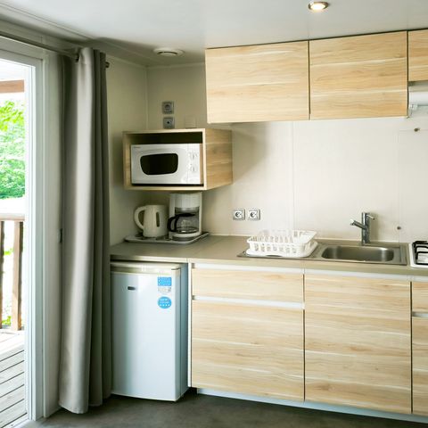MOBILE HOME 4 people - Confort 32m² - 2 bedrooms + 12m² covered terrace + TV + Air conditioning -