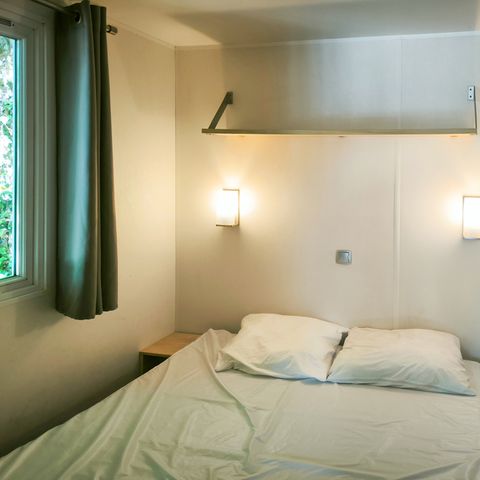 MOBILE HOME 4 people - Confort 32m² - 2 bedrooms + 12m² covered terrace + TV + Air conditioning -