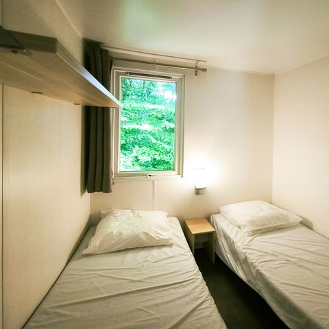 MOBILE HOME 4 people - Confort 32m² - 2 bedrooms + 12m² covered terrace + TV + Air conditioning -