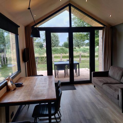 UNUSUAL ACCOMMODATION 24 people - Group room the Strandhuis + 6 Tiny Houses (24 people)