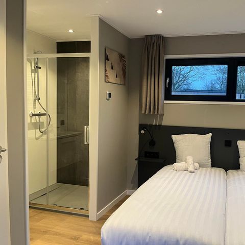 Group accommodation 10 persons - L-cube switched sauna 10